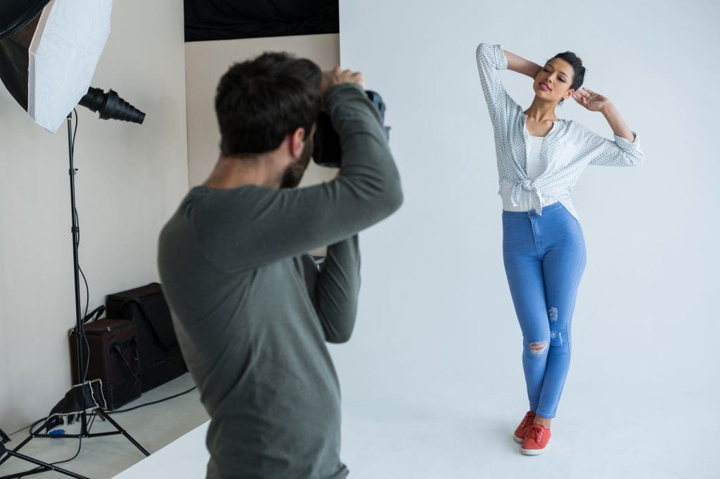 Female model posing for photographer